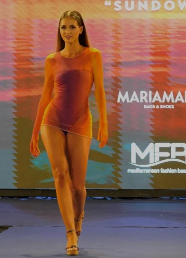 Maica-Benedicto-while-walking-the-ramp-at-a-fashion-show.png